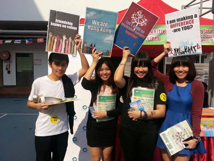 Picture of youths holding placards carrying equality messages